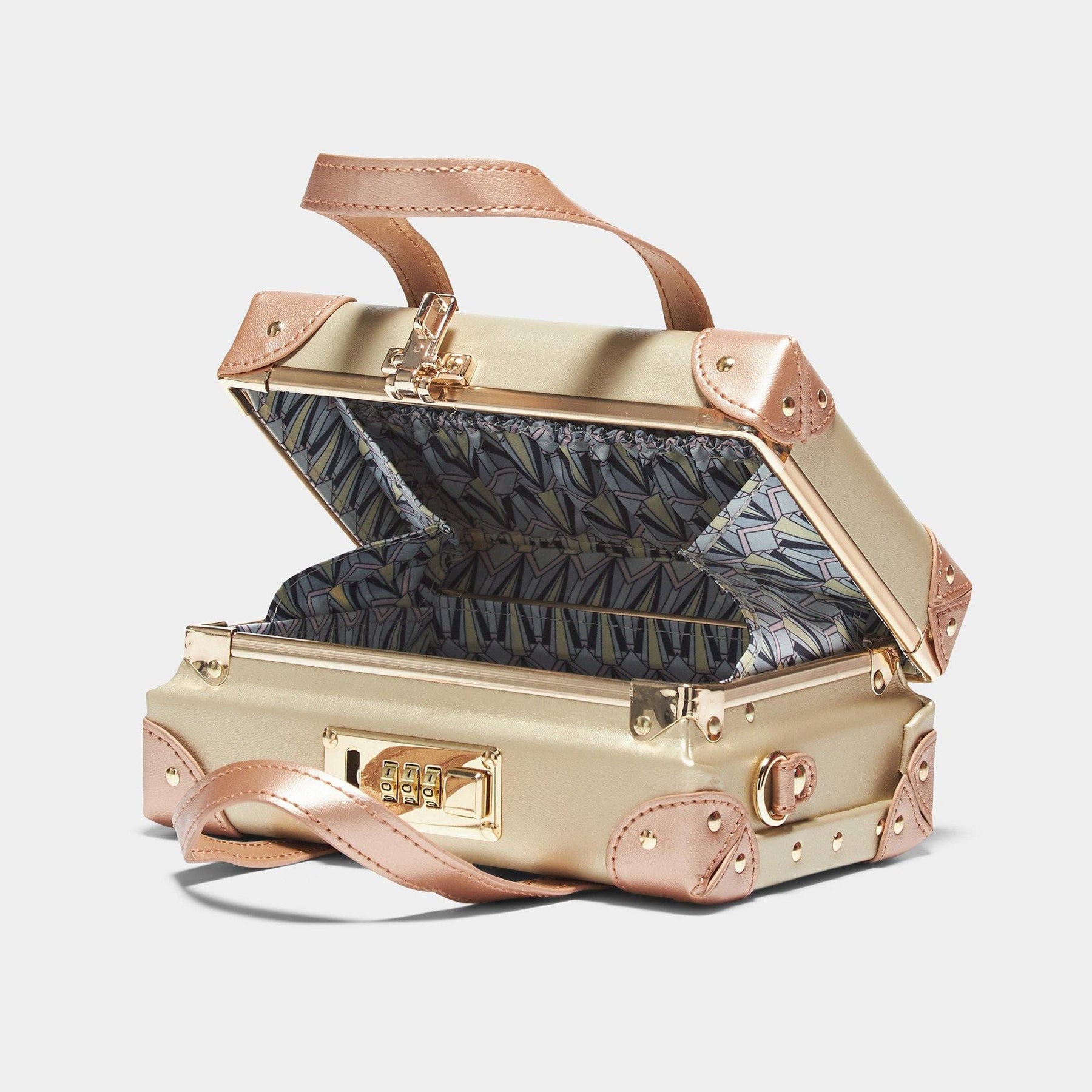 Open product view of the mini Alchemist vegan leather suitcase in gold with art-deco print lining