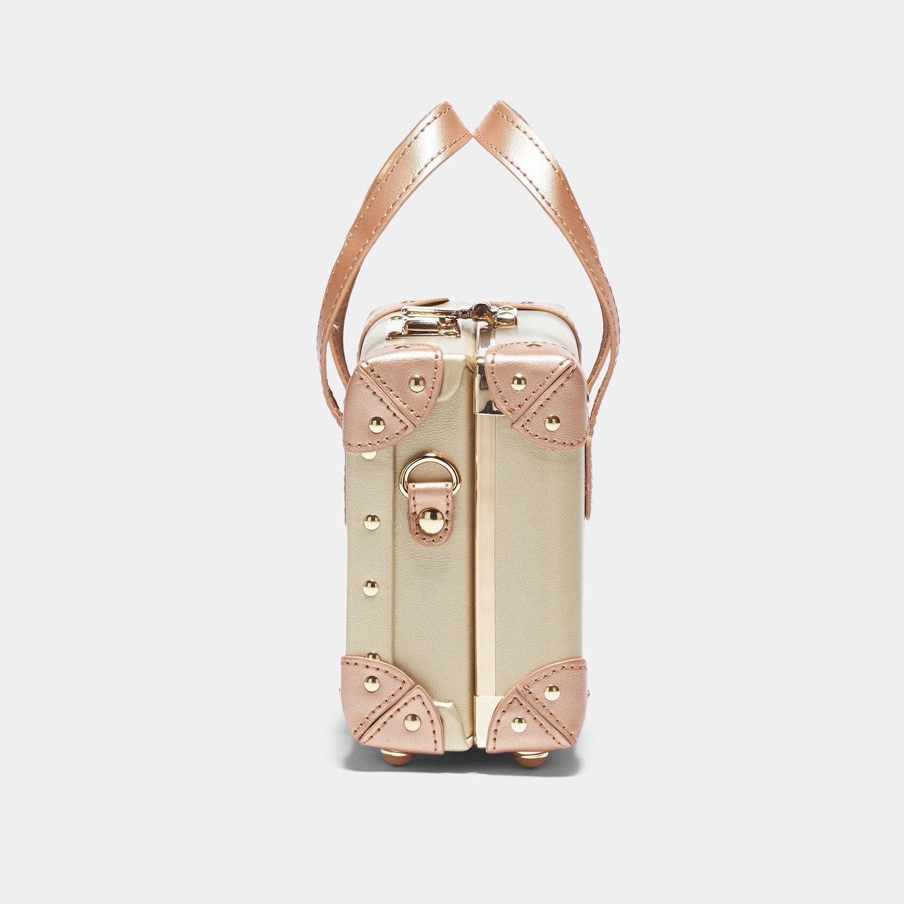 Side view of the mini Alchemist vegan leather suitcase in gold