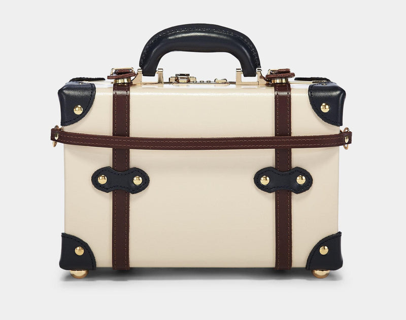 Product view of the vanity Architect leather suitcase in cream with suitcase attachment strap