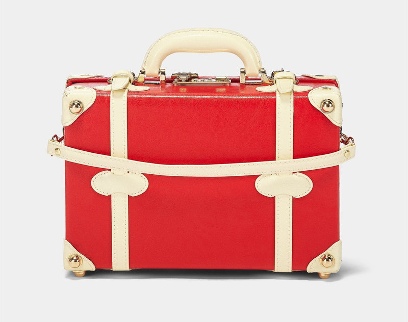 Back product view of the vanity Entrepreneur vegan leather suitcase in lipstick red with detachable suitcase strap