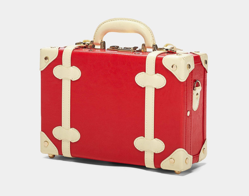 Angled product view of the vanity Entrepreneur vegan leather suitcase in  lipstick red