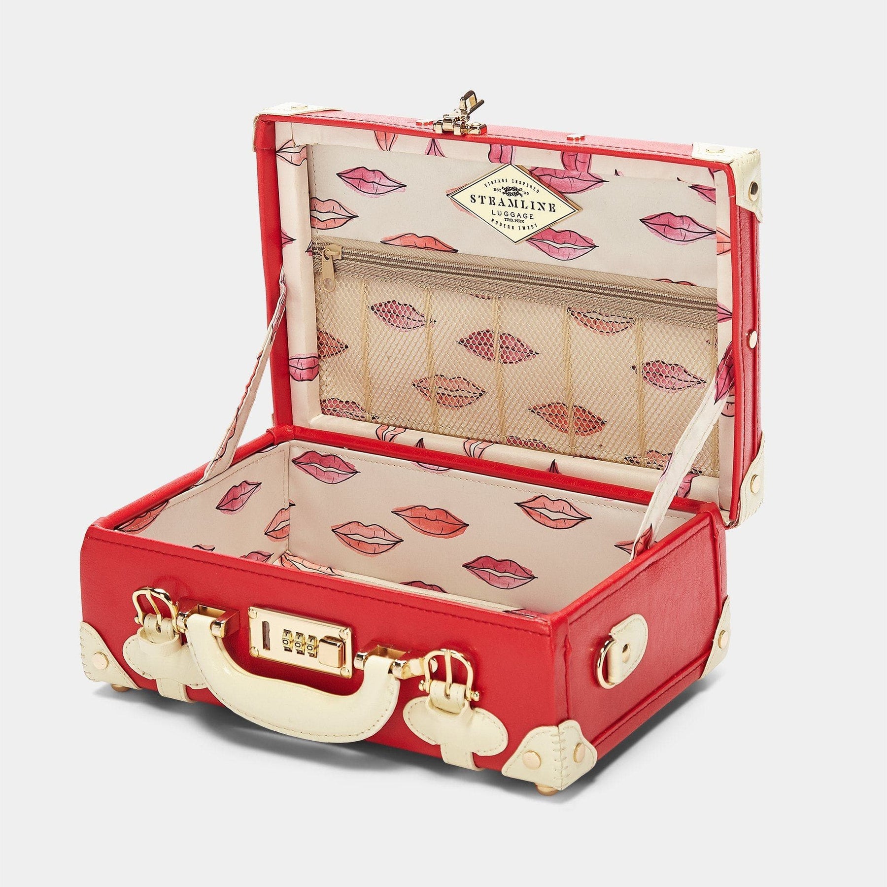 Open product view of the vanity Entrepreneur vegan leather suitcase in lipstick red with lip print lining