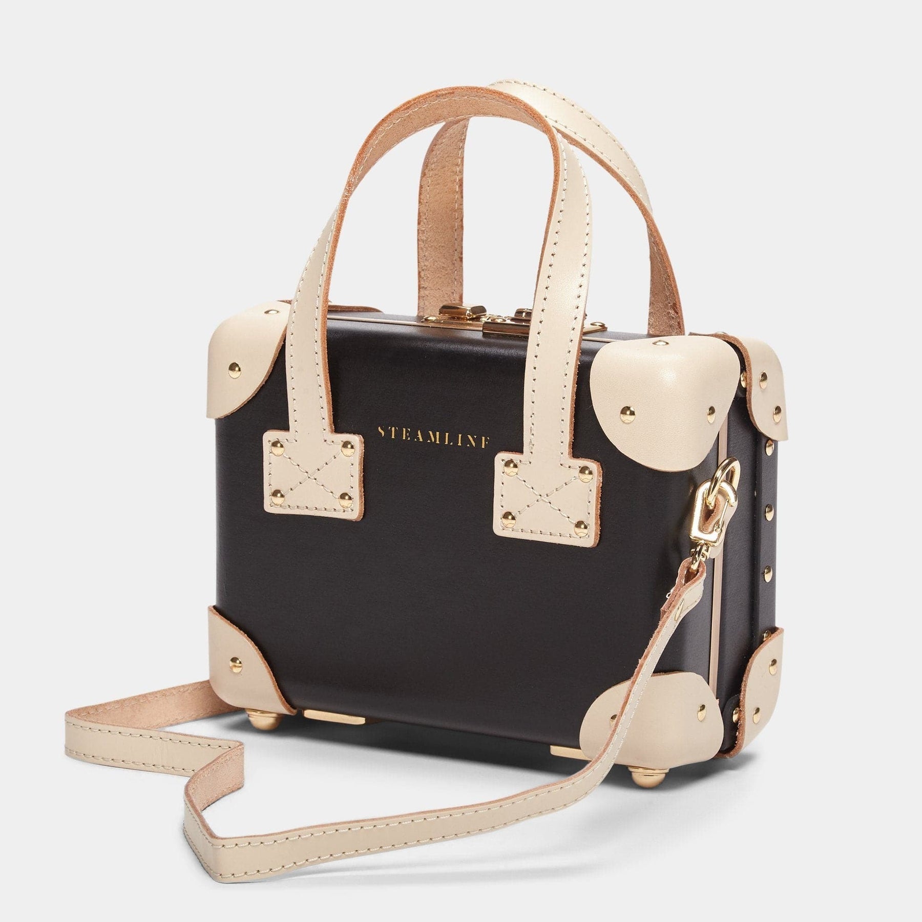 Angled product view of the mini Starlet fibreboard suitcase in black with shoulder attachment strap