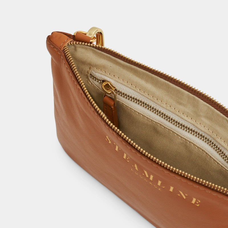 Open product view of the Navigator leather crossbody in nut with gold trims and ecru lining