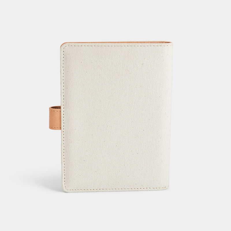 Back product view of the Navigator leather passport holder in white with desert glitter trim