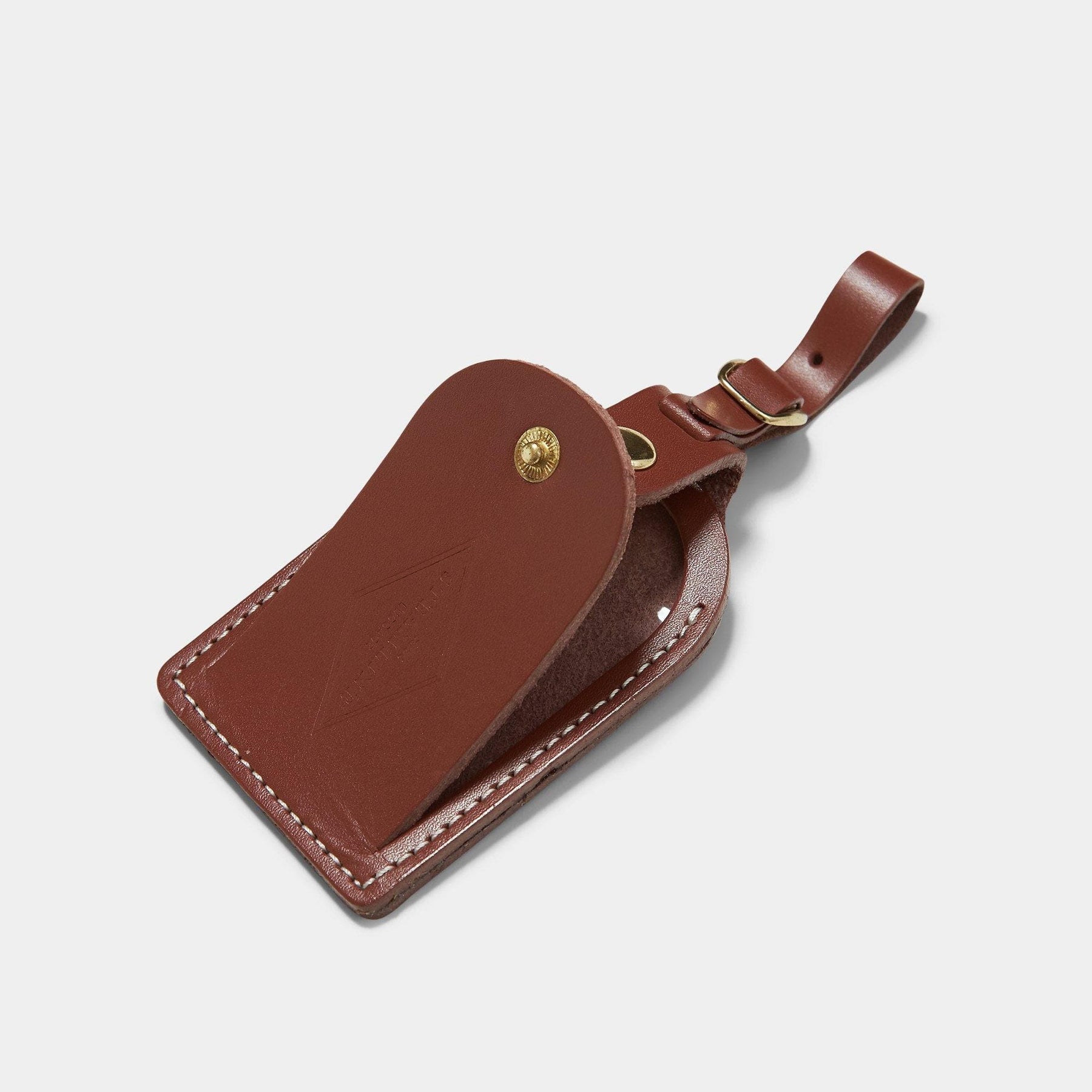 british brown leather luggage tag opened
