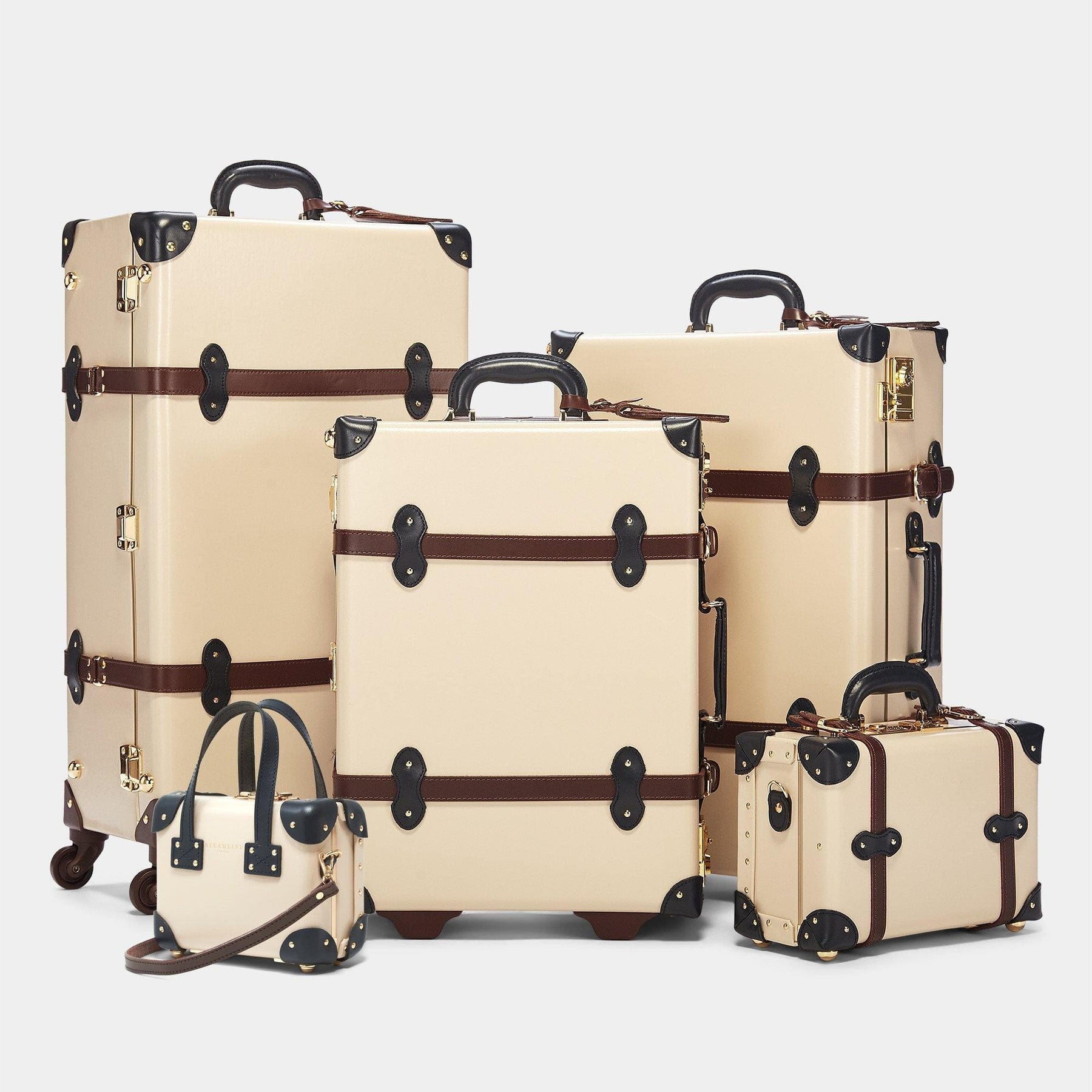 Retro luggage set of The Architect leather suitcase in cream