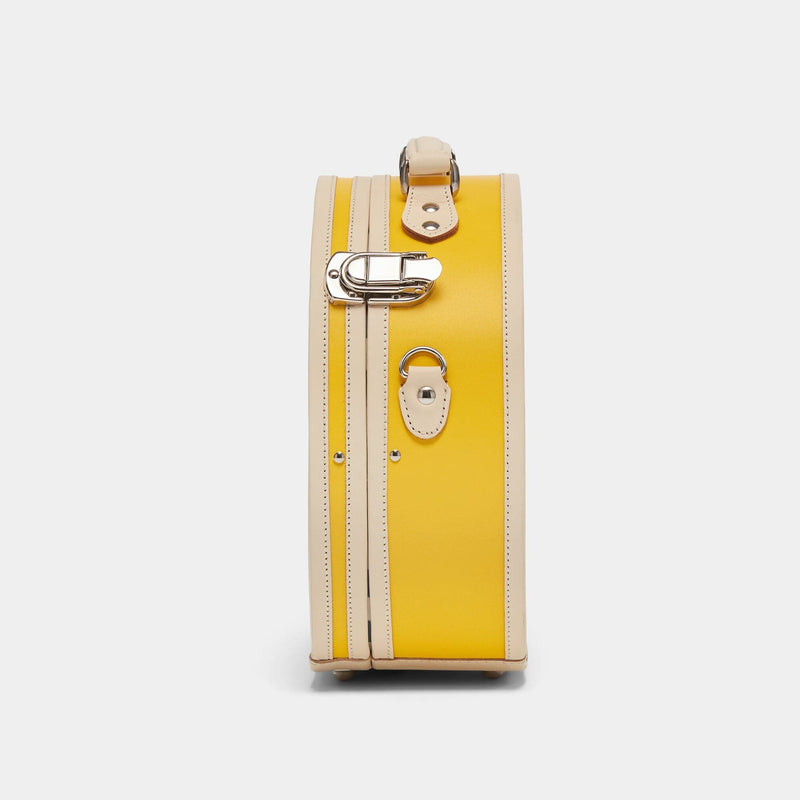 Side product view of the small hatbox Correspondent fibreboard suitcase in canary yellow