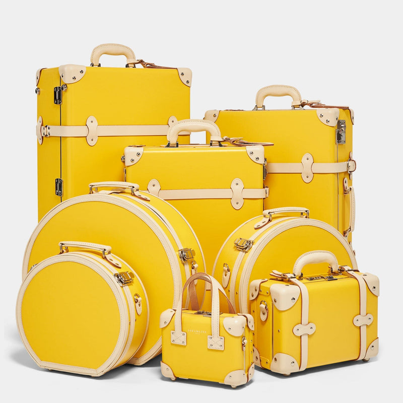 Steamline vintage luggage set of The Correspondent fibreboard suitcase in canary yellow