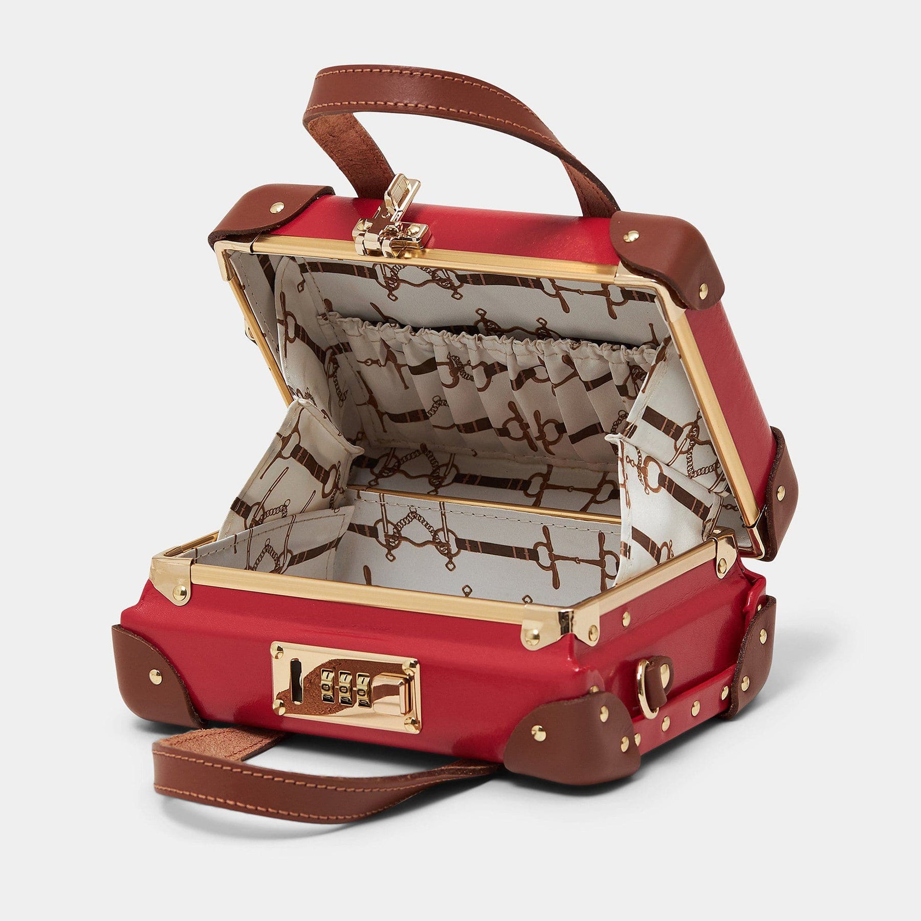 Open product view of the mini Diplomat leather suitcase in red with snaffle-bit printed lining