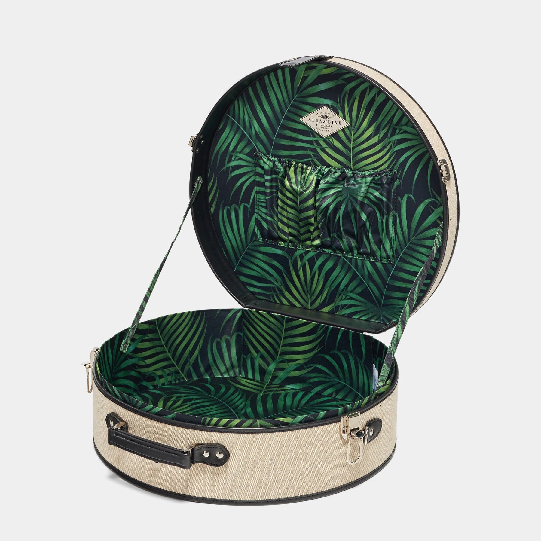 Open product view of the deluxe hatbox Editor linen suitcase with black trims and palm-leaf print lining