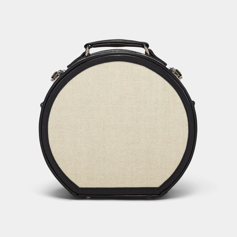 Back product view of the small hatbox Editor linen suitcase with black trims