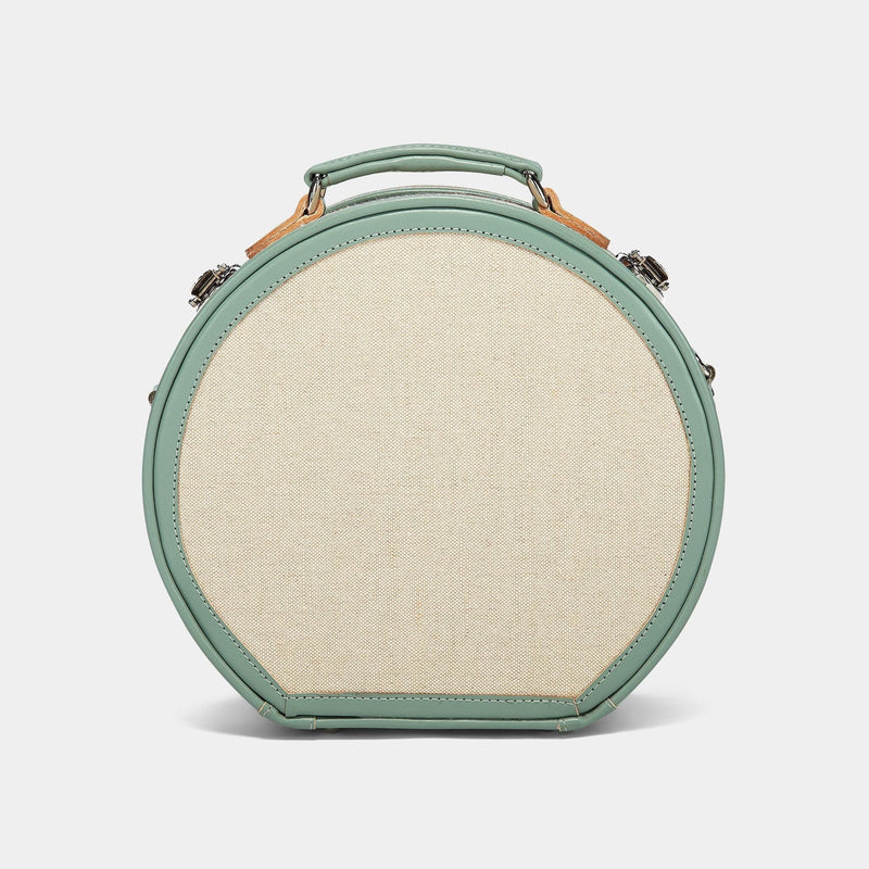 Back product view of the small hatbox Editor linen suitcase with sea green trims