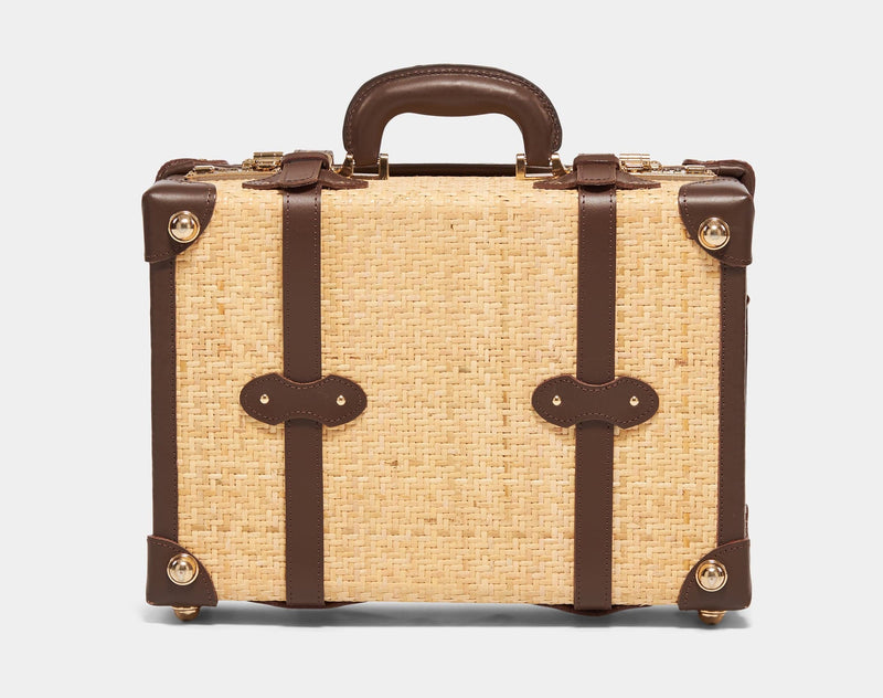 Back product view of the overnighter Explorer rattan suitcase in natural wicker body and brown trims