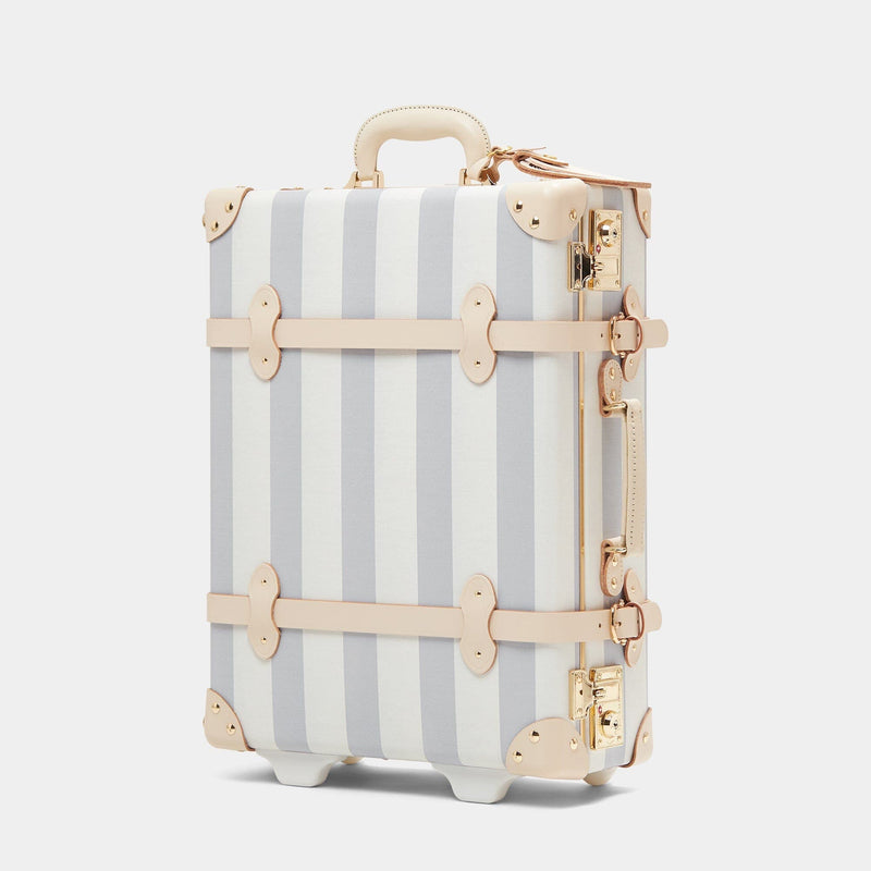 Angled product view of the carry-on Illustrator fibreboard suitcase in blue-stripe 