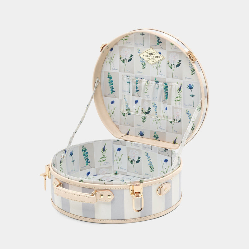 Open product view of the large hatbox Illustrator fibreboard suitcase in blue-stripe with wildflower print lining