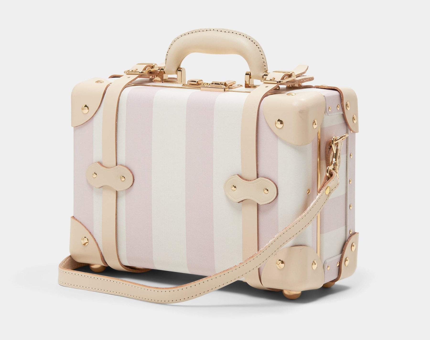 Angled product view of the mini Illustrator fibreboard suitcase in pink-stripe with shoulder attachment strap