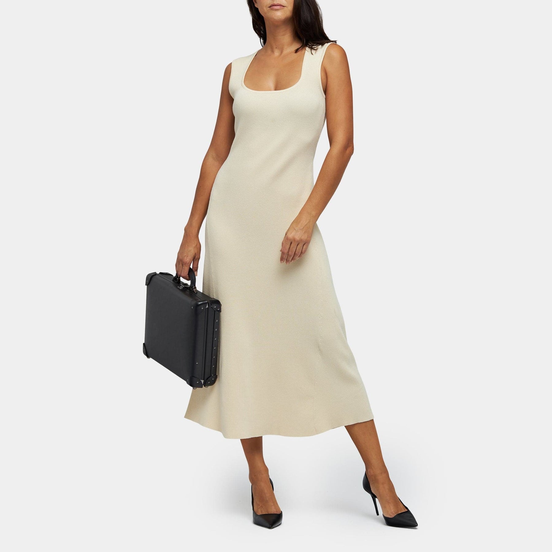 Model with the briefcase Industrialist fibreboard suitcase in black