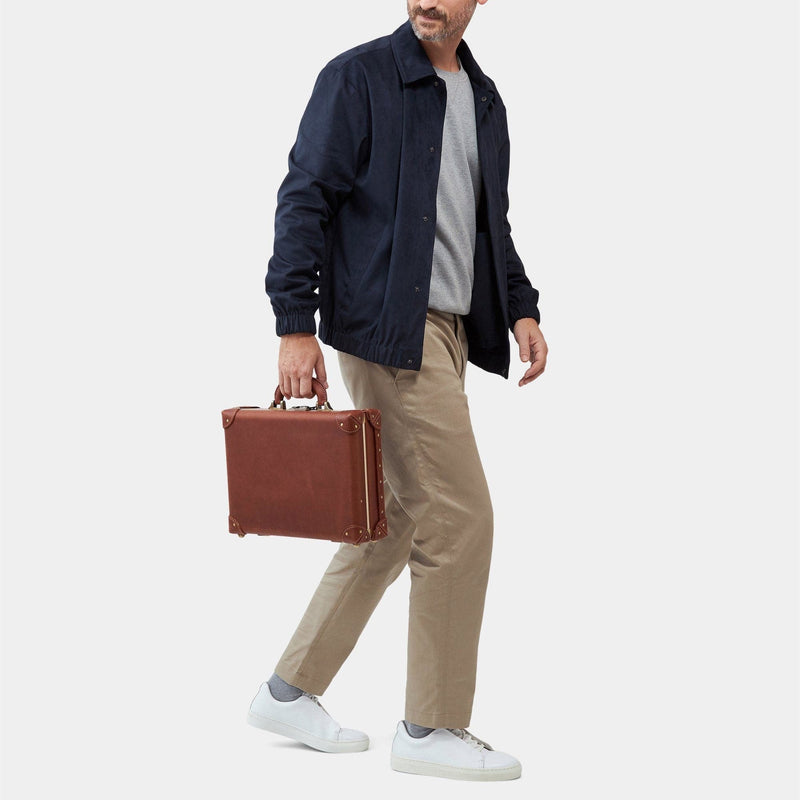 Male model with the briefcase Pioneer leather suitcase in brown