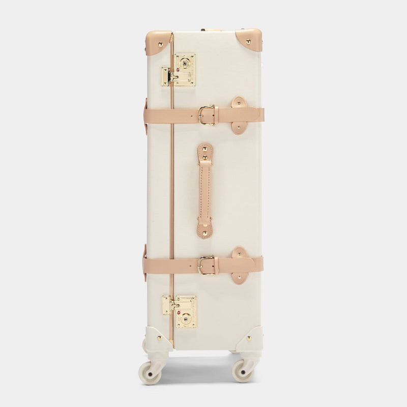 Side product view of the check-in spinner Sweetheart fibreboard suitcase in cream