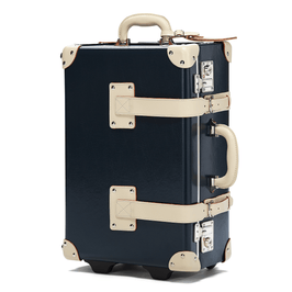 Angled product view of the carry-on Anthropologist leather suitcase in navy