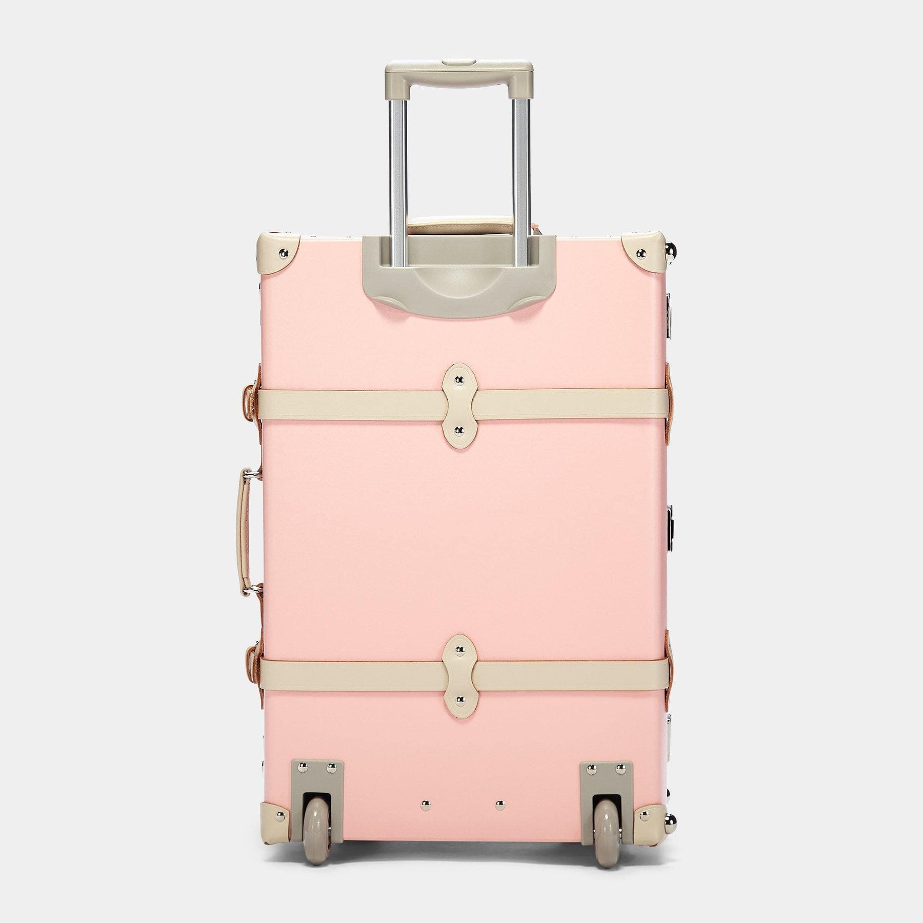 Back product view of the check-in Botanist fibreboard suitcase in pink with raised handle