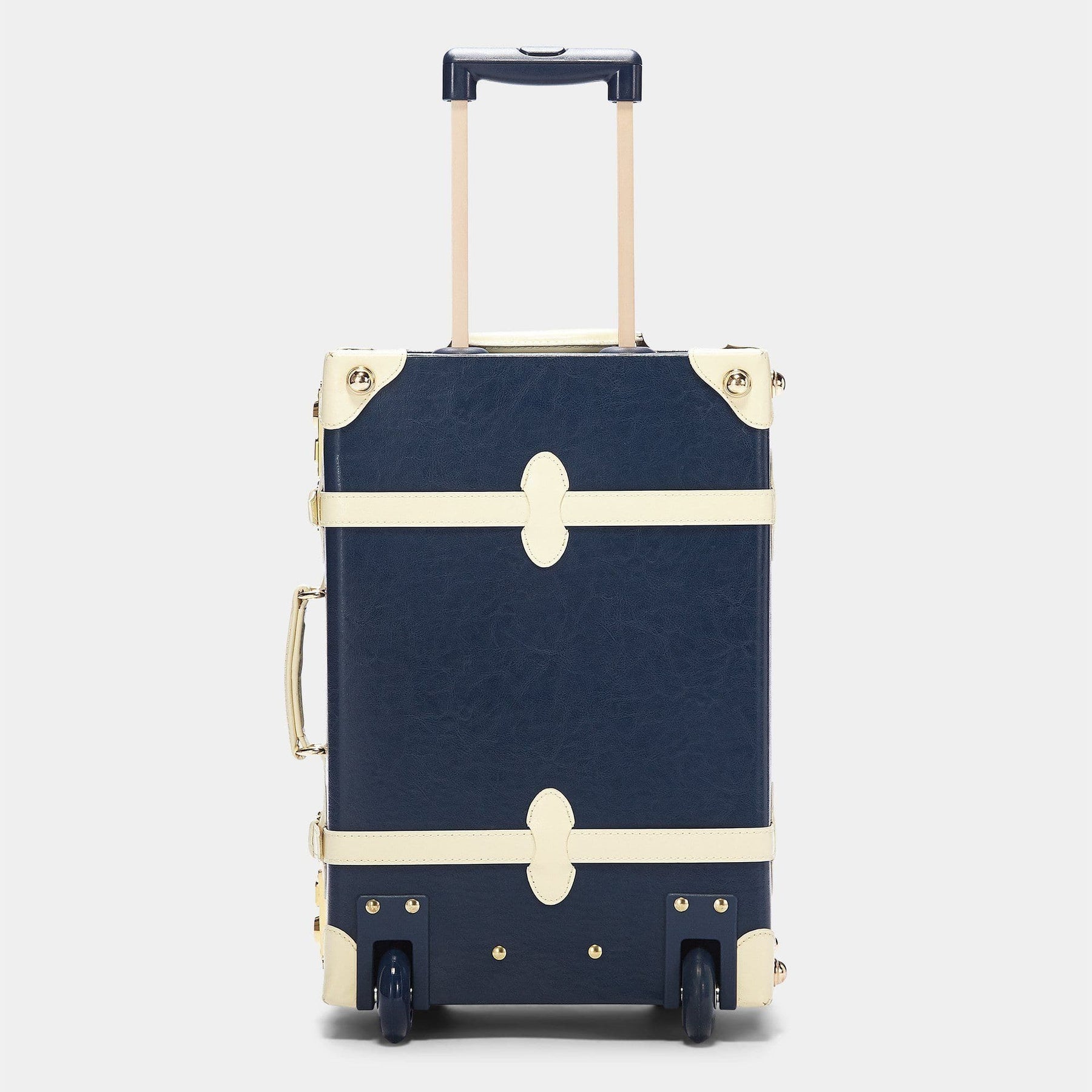 Back product view of the carry-on Entrepreneur vegan leather suitcase in navy with raised handle