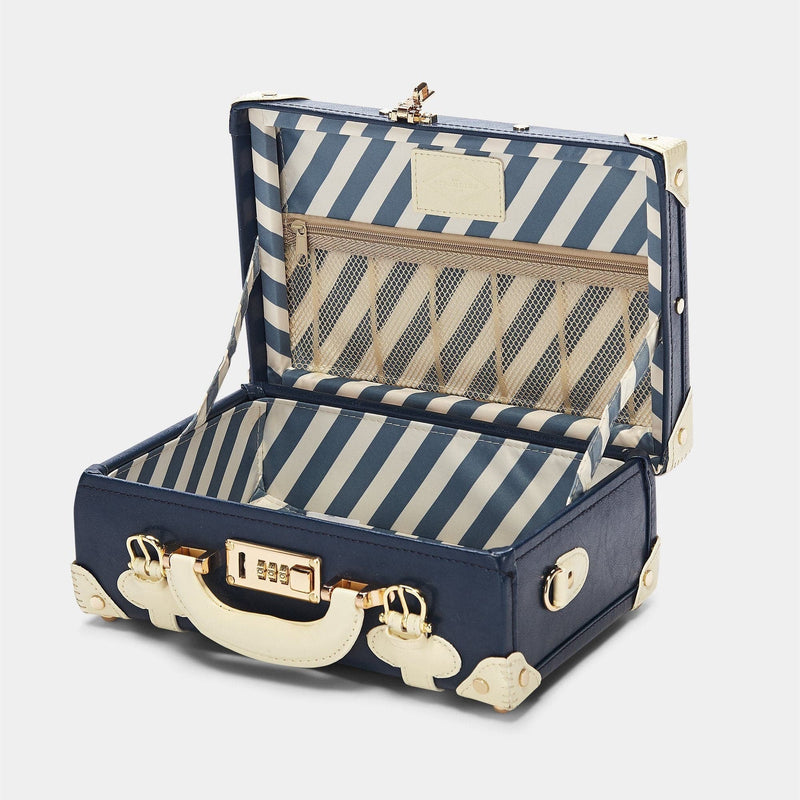 Open product view of the vanity Entrepreneur vegan leather suitcase in navy with blue-white stripe print lining