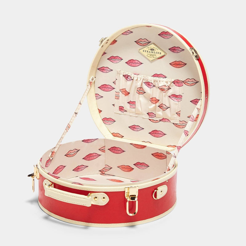Open product view of the large hatbox Entrepreneur vegan leather suitcase in lipstick red with lip print lining