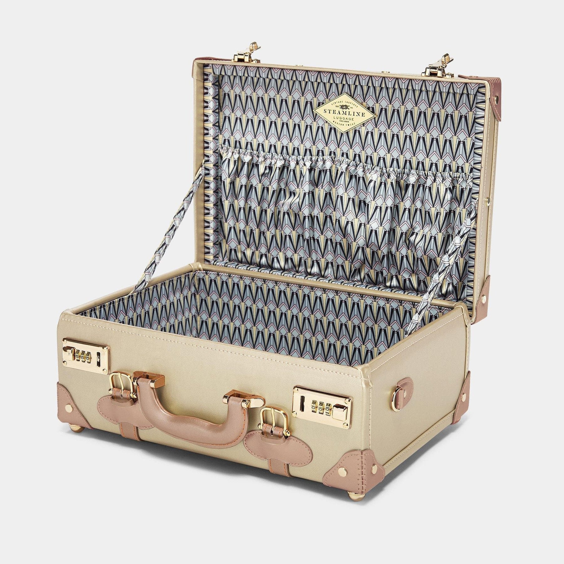 Open product view of the overnighter Alchemist vegan leather suitcase in gold with art-deco print lining