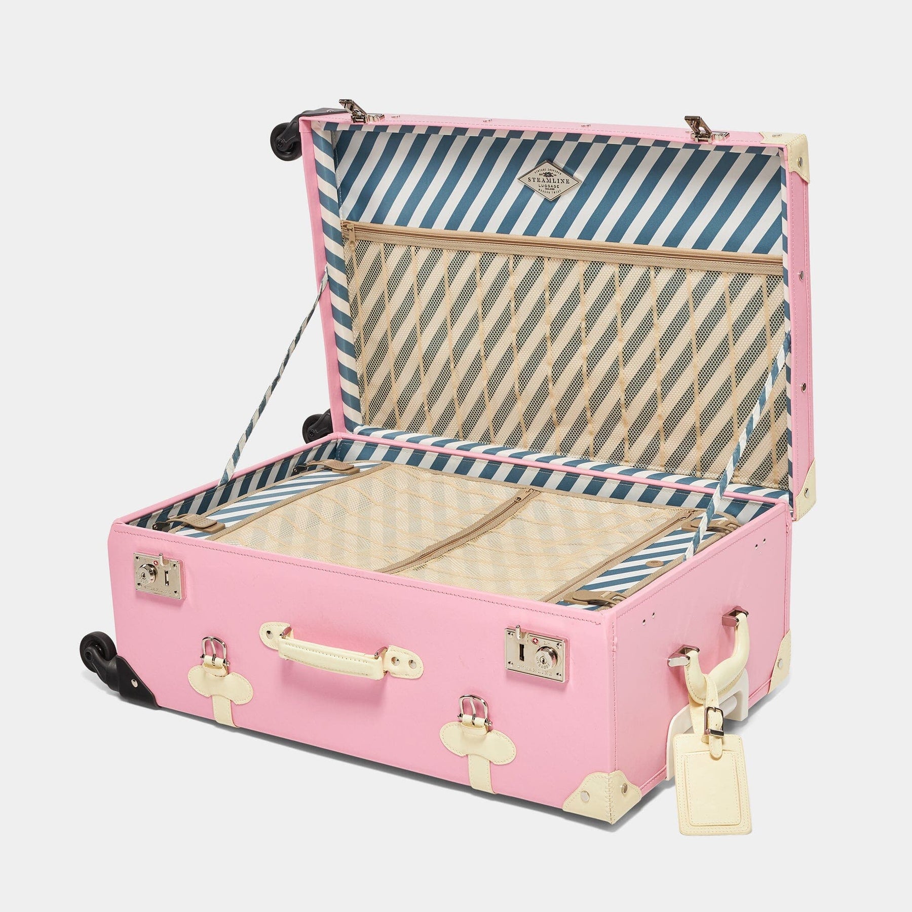 Open product view of the check-in spinner Entrepreneur vegan leather suitcase in pink with blue-white stripe print lining and white vegan leather luggage tag