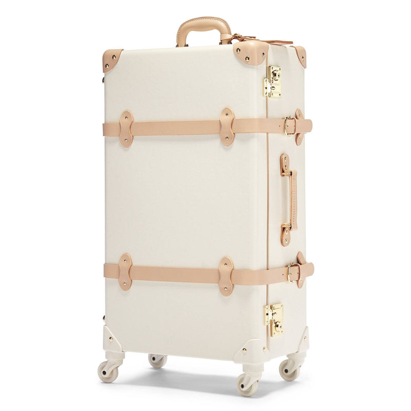 Angled product view of the check-in Sweetheart fibreboard suitcase in cream