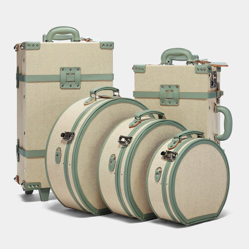 Designer luggage set of The Editor linen suitcase with sea green trims
